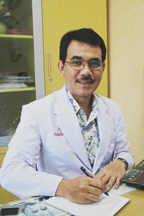 Dr. Sondang Rexano A.K, SpKFR